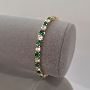 Emerald and diamonds cushion shape tennis bracelet